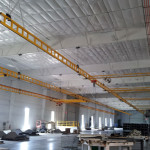 Hang an enclosed track system from the ceiling