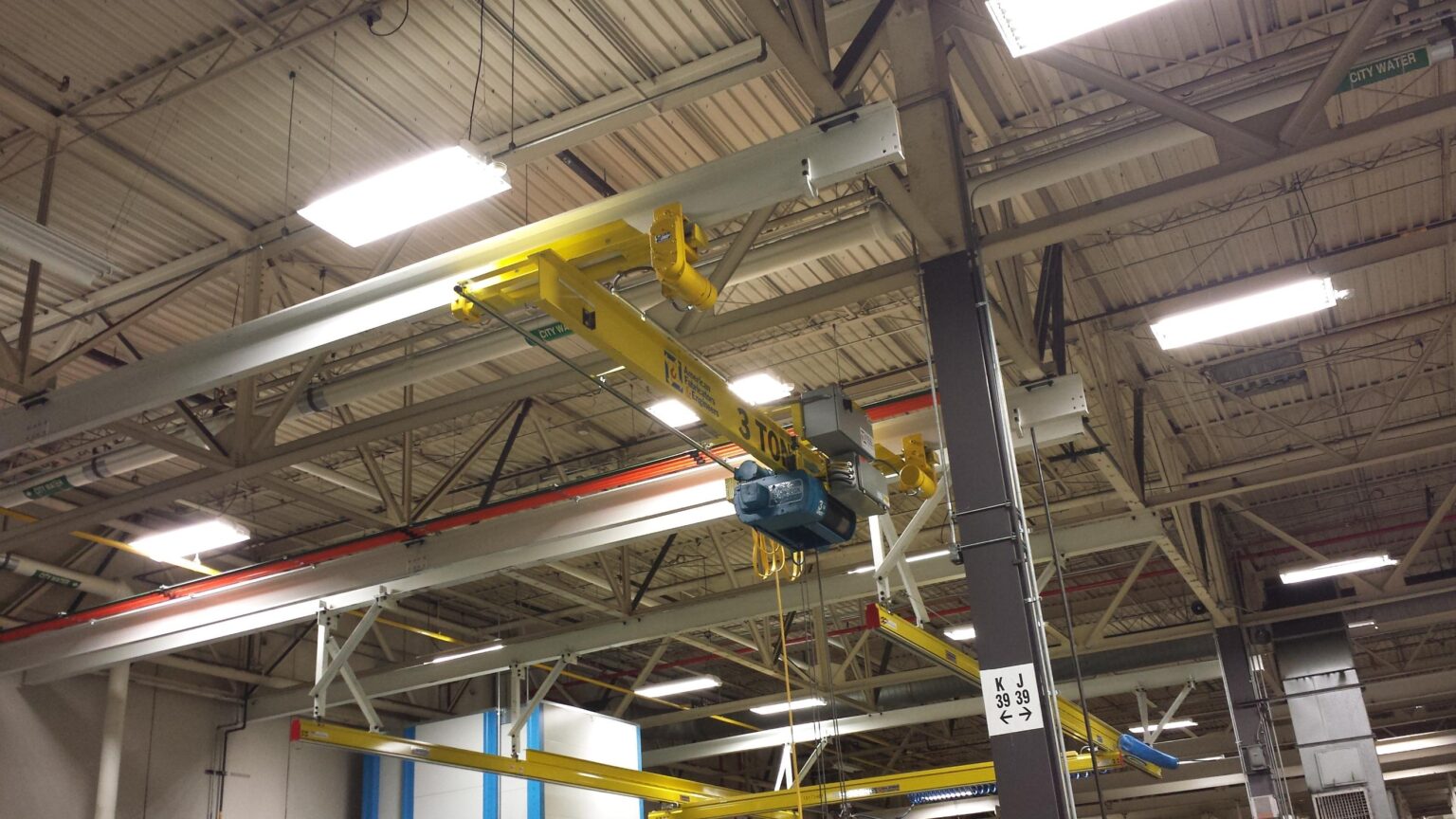 3 Ton Under Hung Patented Track Bridge Crane with an adjacent Workstation Bridge Crane