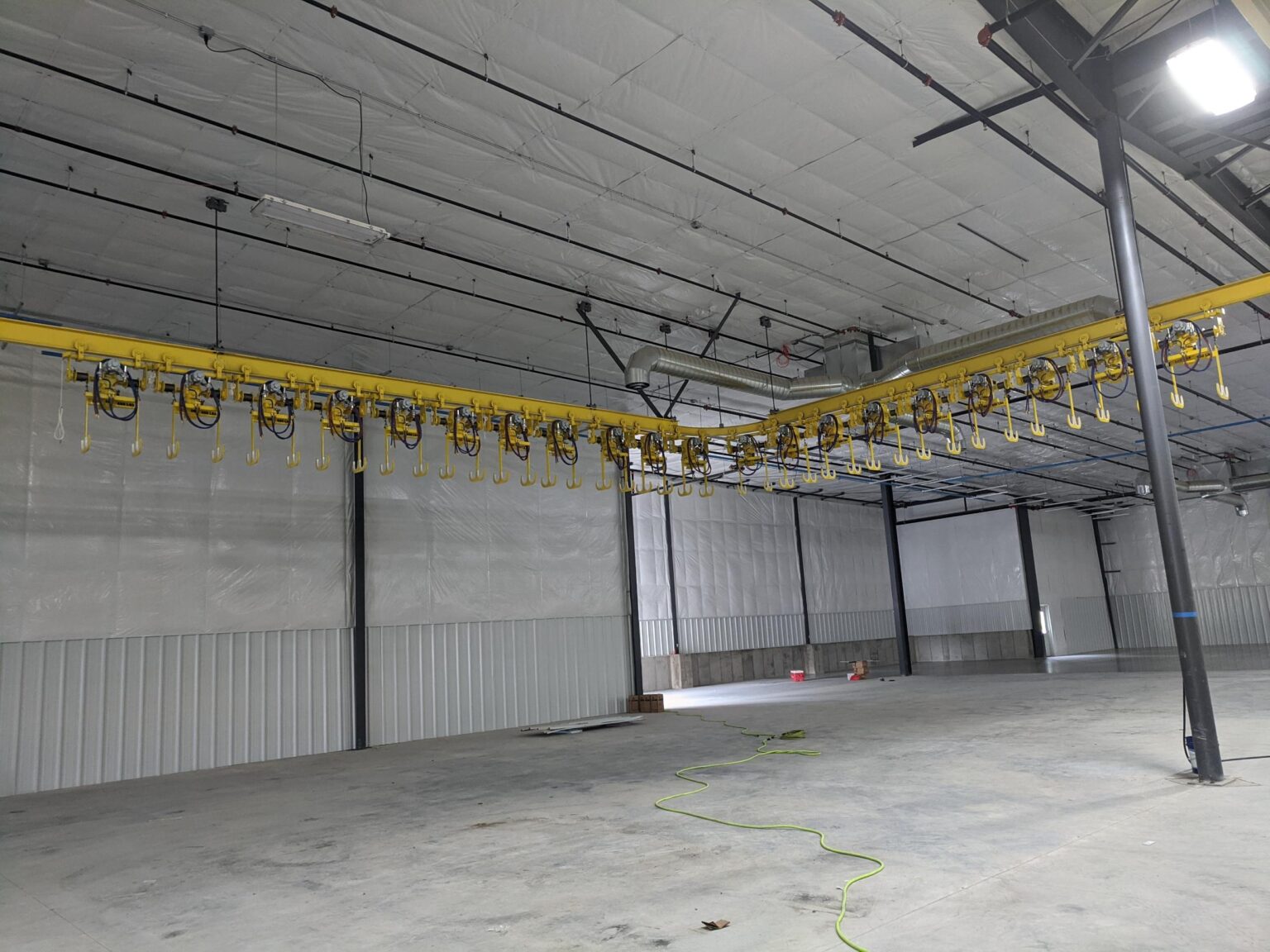 Patented Track Monorail with AFE Crane Custom Designed Trolleys