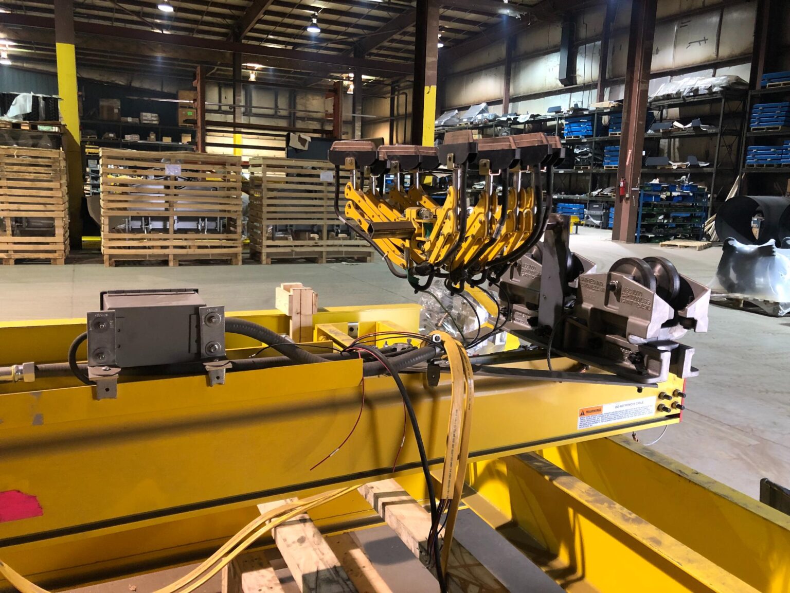 Unified Bridge Crane with Patented Track End Trucks and Duct-o-Wire Collectors