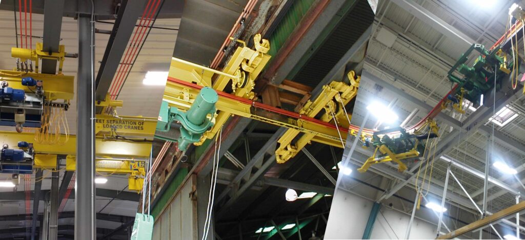 Overhead crane coverage options showing telescoping, interlock transfer, and specialty crane systems.